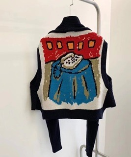 전화기 그림무늬 민소매 니트 가디건   Phone picture-patterned sleeveless knit cardigan
